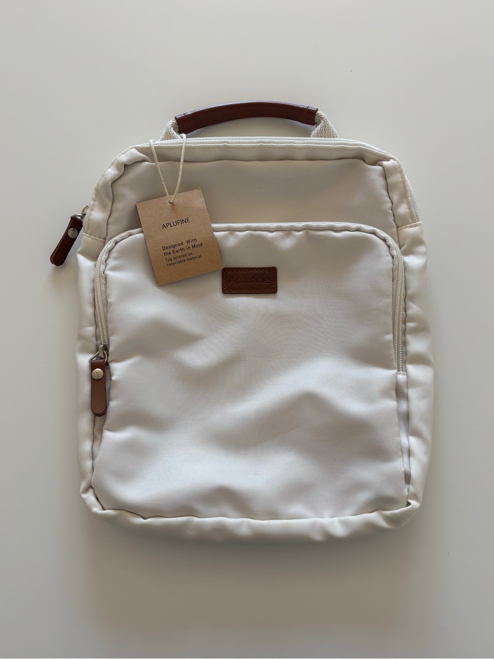Aelfric & Co. Aplurine backpack in cream & white